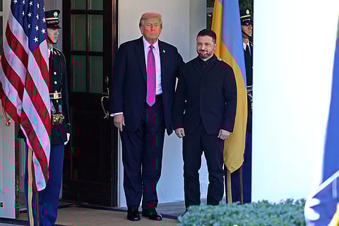 President Donald Trump, left, greets Ukraine's President Volodymyr Zelenskyy at the White House, Friday, Oct. 17, 2025, in Washington