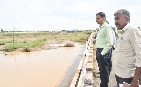 District collector inspecting water levels at Uppar odai at Pudukottai bridge here on Saturday. 