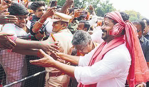 The cheif minister greets people at Sadar Sammelan Utsav in Hyderabad on Sunday 