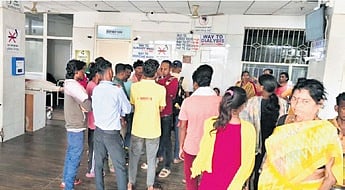 Families of patients waiting in hospital.