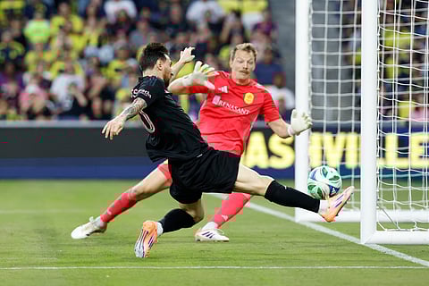 MLS Commissioner Don Garber presents the Golden Boot award to Inter Miami forward Lionel Messi before match one of an MLS playoff opening round soccer match against the Nashville SC, Friday, Oct. 24, 2025, in Fort Lauderdale, Fla.