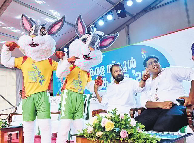 General Education Minister V Sivankutty and General Education Director N S K Umesh interacting with the lucky mascots ‘Thanku the Rabbit’ at the inaugural ceremony of the Kerala State School Sports Meet at the University Stadium 
on Tuesday 