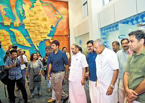 Chief Minister Pinarayi Vijayan at the newly inaugurated Kochi corporation office on Tuesday, Mayor M Anilkumar, MP Hibi Eden and MLA K Babu are also seen
