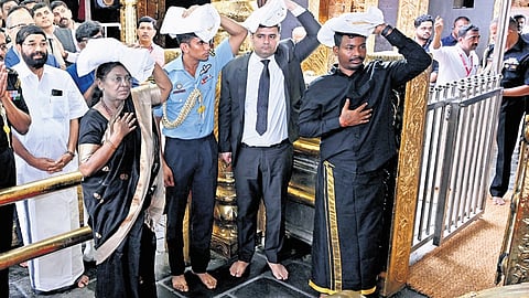 President Droupadi Murmu offering prayers at the sreekovil of the Sabarimala temple on Wednesday.