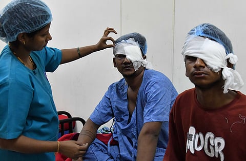 Patients injured while bursting crackers get treatment at Minto Eye Hospital in Bengaluru on Tuesday. Around 13 patients were treated by Tuesday afternoon.