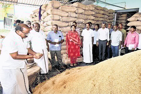 Food and Civil Supplies Minister R Sakkarapani inspecting the TNCSC warehouse at Pillayarpatti in Thanjavur district on Wednesday | Express