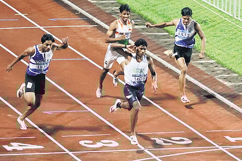 J Nivedkrishna of Palakkad wins gold in the senior boys 100-m race in the State School Athletic Meet at the Chandrasekharan Nair Stadium in Thiruvananthapuram on Thursday