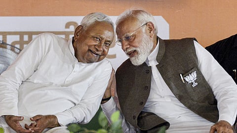 Prime Minister Narendra Modi, right, and Bihar Chief Minister Nitish Kumar during a public meeting ahead of the state Assembly election.