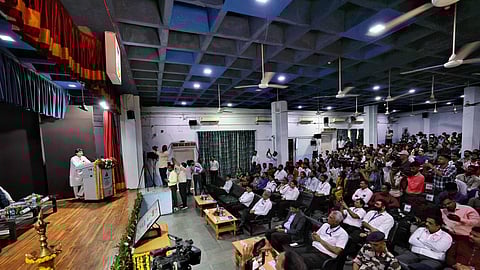 Government employment letter distribution event organised by the Postal Department.