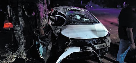 The mangled remains of the car