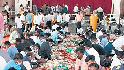 Revenue officials count the cash  collected in hundi of Goddess Hasanamba in Hassan on Friday 