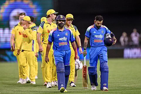 Rohit Sharma (L) and Virat Kohli after helping India beat Australia in the third ODI on Saturday
