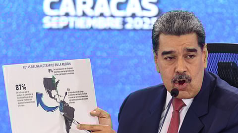 Venezuela's President Nicolas Maduro points at a map of the Americas during a news conference in Caracas, Venezuela, Sept 15, 2025.