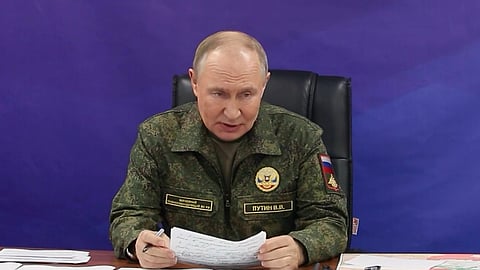 In this image made from video released by the Russian Presidential Press Office on Sunday, Oct. 26, 2025, Russian President Vladimir Putin speaks while visiting one of the command posts of the Joint Group of Forces.