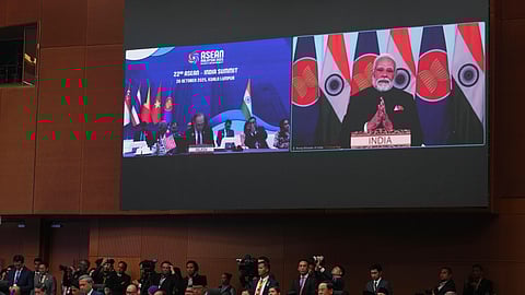 Prime Minister Narendra Modi is seen on a screen at the top right delivering a virtual speech to ASEAN leaders during the 47th Association of Southeast Asian Nations (ASEAN) Summit in Kuala Lumpur, Malaysia, Sunday, Oct. 26, 2025.