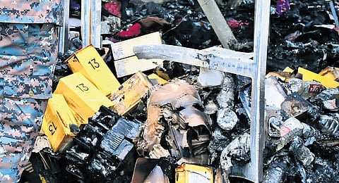 New mobile phones seen at the cargo log of the bus that went of fire.