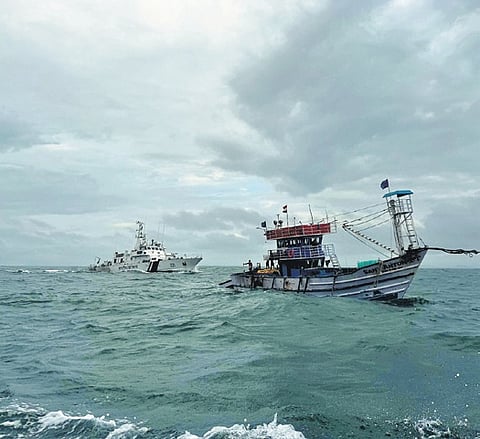 Fishermen being rescued by the Indian Coast Guard