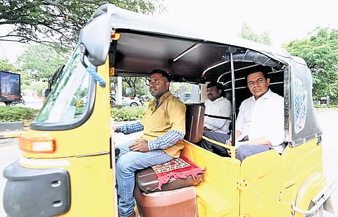 BRS working president KT Rama Rao travels in an auto in Hyderabad on Monday