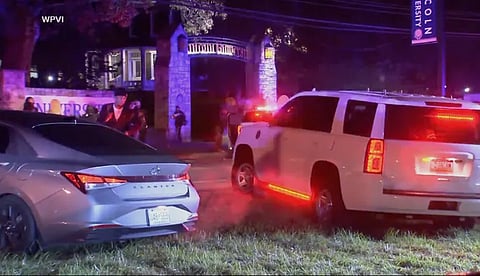 Law enforcement are seen outside Pennsylvania’s Lincoln University after a deadly shooting late Saturday, Oct, 25, 2025 near Oxford, Pa.