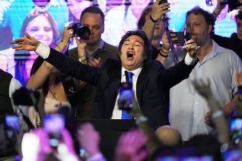 Argentina's President Javier Milei celebrates after winning in legislative midterm elections in Buenos Aires, Argentina, Sunday, Oct. 26, 2025. 