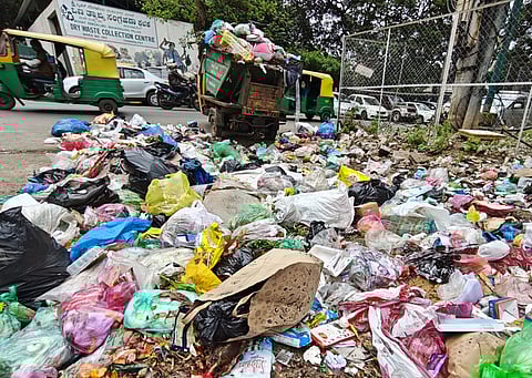 Garbage scattered on the road in front of the dry waste collection centre in Bengaluru.