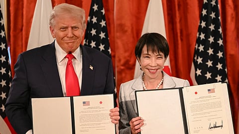 Japan's Prime Minister Sanae Takaichi (R) and US President Donald Trump attend a signing ceremony after a Japan-US Summit at the Akasaka State Guest House in Tokyo on October 28, 2025.