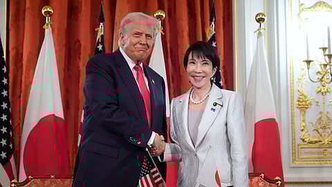 President Donald Trump, left, and Japan's Prime Minister Sanae Takaichi shake hands during a signing ceremony at Akasaka Palace in Tokyo, Japan, Tuesday, Oct. 28, 2025.