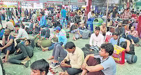 Hundreds of migrant workers waiting at Chennai Central on Tuesday.