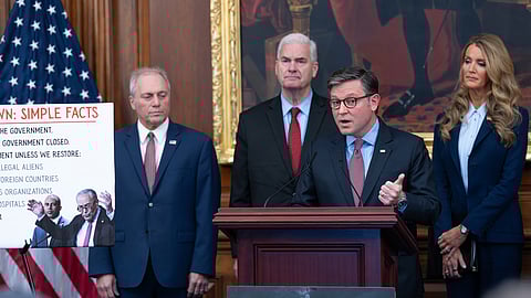 Speaker of the House Mike Johnson, R-La., faces reporters, joined from left by Majority Leader Steve Scalise, R-La., Majority Whip Tom Emmer, R-Minn., and Small Business Administration head Kelly Loeffler at a news conference on day 27 of the government shutdown, at the Capitol in Washington, Monday, Oct. 27, 2025.