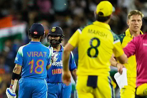 India's not out batters Virat Kohli, left, and India's Rohit Sharma celebrate after their win over Australia during their One Day International cricket match in Sydney, Australia, Saturday, Oct. 25, 2025. 