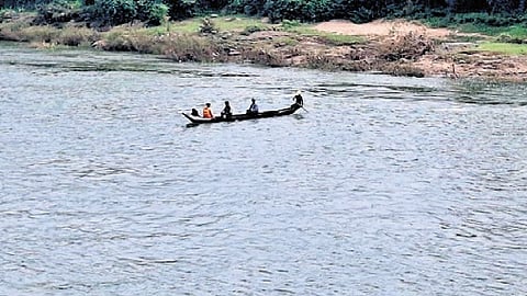 A country boat ferrying devotees from Mancheswar ghat to Dhabaleswar temple | Express