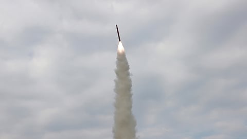 North Korea touts missile tests as Trump visits South Korea