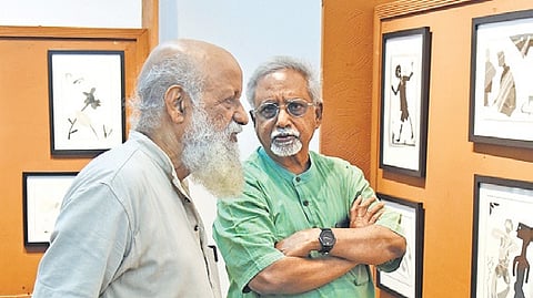 Karnataka Lalitha Kala Academy president Pa Sa Kumar with Prasanna at an exhibition of prints — Playing with Life — on Thursday.