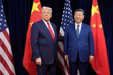 President Donald Trump, left, and Chinese President Xi Jinping pose ahead of their summit talk at Gimhae International Airport in Busan, South Korea, Thursday, Oct. 30, 2025. 