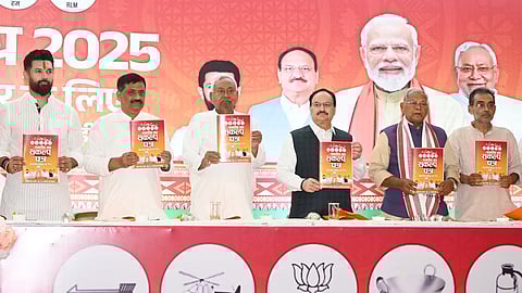 BJP National President and Union Minister JP Nadda with Union Ministers Chirag Paswan and Jitan Ram Manjhi, Bihar Chief Minister Nitish Kumar and JDU National Working President Sanjay Jha releases the National Democratic Alliance's (NDA) manifesto for the upcoming Bihar Assembly elections, in Patna, Friday, Oct. 31, 2025.