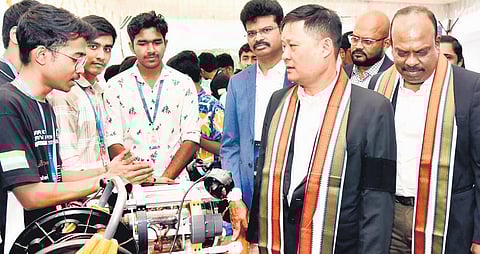 Royal Thai Consulate-General Racha Aribarg interacts with students at the technical festival on Friday 