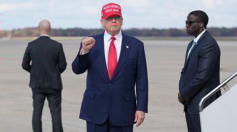 President Donald Trump gestures as he arrives on Air Force One, Thursday, Oct. 30, 2025, at Joint Base Andrews, Md., after returning from a trip to Asia.