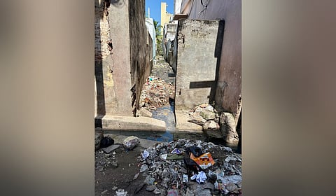 Residents of Thirumalai Reddy Street at Kosapet, Vellore suffer after every rain as sewage water from the drain running behind their homes enters their houses. 