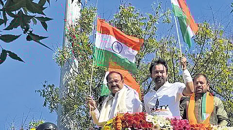 Former V-P Venkaiah Naidu and Union minister G Kishan Reddy hold national flags after garlanding the statue of Sardar Vallabhbhai Patel on his 150th birth anniversary in Hyderabad on Friday.