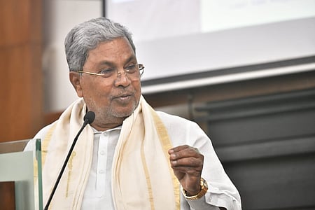 CM Siddaramaiah addresses a gathering at the inauguration of projects in Kudligi on Sunday 