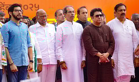  NCP (SP) chief Sharad Pawar, second left, Shiv Sena (UBT) chief Uddhav Thackeray, front center, Maharashtra Navnirman Sena (MNS) chief Raj Thackeray, second right, NCP (SP) leader Jayant Patil, right, Shiv Sena (UBT) leader Aaditya Thackeray, left, and others during a protest by Maha Vikas Aghadi (MVA), an alliance between Congress, Shiv Sena (UBT) and NCP (SP), against alleged irregularities in the voters list, in Mumbai, Saturday, Nov. 1, 2025.