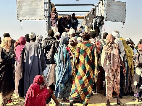 This photo released by The Norwegian Refugee Council (NRC) shows displaced families from el-Fasher at a displacement camp where they sought refuge from fighting between government forces and the RSF, in Tawila, Darfur region, Sudan, Friday, October. 31, 2025.