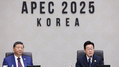 South Korean President Lee Jae Myung, right, speaks next to Chinese President Xi Jinping at the Asia-Pacific Economic Cooperation (APEC) Economic Leaders' Meeting in Gyeongju, South Korea, Saturday, Nov. 1, 2025. 