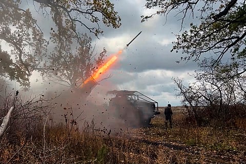 In this image made from video provided by the Russian Defense Ministry Press Service on Friday, Oct. 31, 2025, a Russian "Grad" self-propelled 122 mm multiple rocket launcher fires towards Ukrainian positions on an undisclosed location in Ukraine.