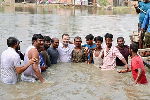A large number of fishermen were present at the spot, some of whom dived to join the leaders in chest-deep waters.