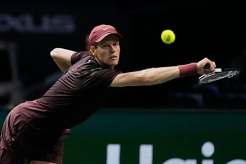 Italy's Jannik Sinner holds the trophy after winning the final match of the Paris Masters tennis tournament against Canada's Felix Auger-Aliassime in Paris, Sunday, Nov. 2, 2025.