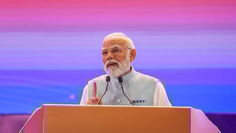 In this image received on Nov. 3, 2025, Prime Minister Narendra Modi addresses the Emerging Science, Technology and Innovation Conclave (ESTIC) 2025, at Bharat Mandapam, in New Delhi. 