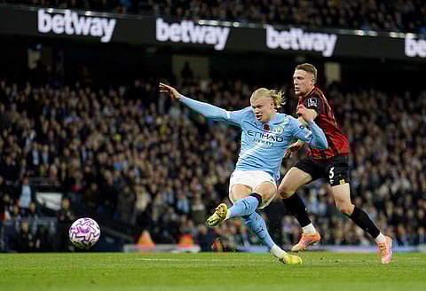 Manchester City's Erling Haaland scores his sides first goal during the English Premier League soccer match between Manchester City and Bournemouth in Manchester, England, Sunday, Nov. 2, 2025. 