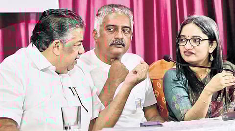 Minister for Cultural Affairs Saji Cherian, actor and jury chairman Prakash Raj and Cultural Affairs Department Director Divya S Iyer during the announcement of the Kerala State Film Awards 2024 in Thrissur on Monday