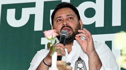 Rashtriya Janata Dal (RJD) leader and Mahagathbandhan's CM face Tejashwi Yadav speaks at a press conference in Patna.